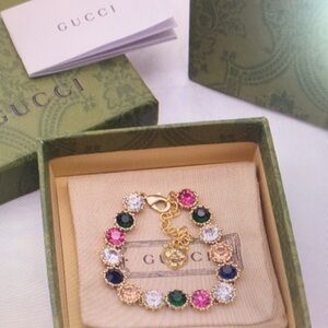 Gucci Gold Multi-Gemstone Charm Bracelet - Pink, Green, Blue, Clear